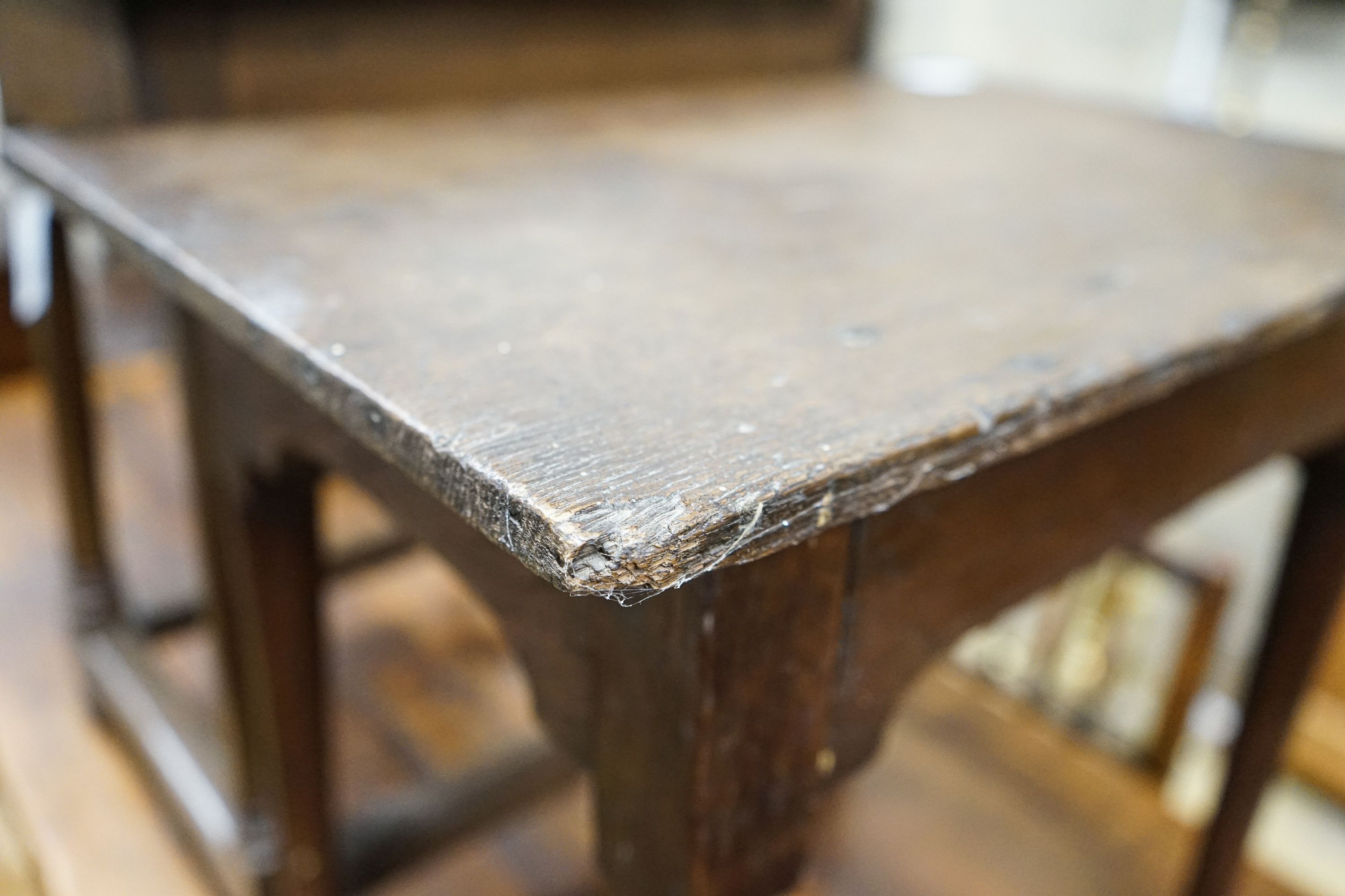 An early 18th century oak side table, with turned legs and pad feet, width 58cm and a 17th century style oak side table, width 55cm, depth 36cm, height 61cm